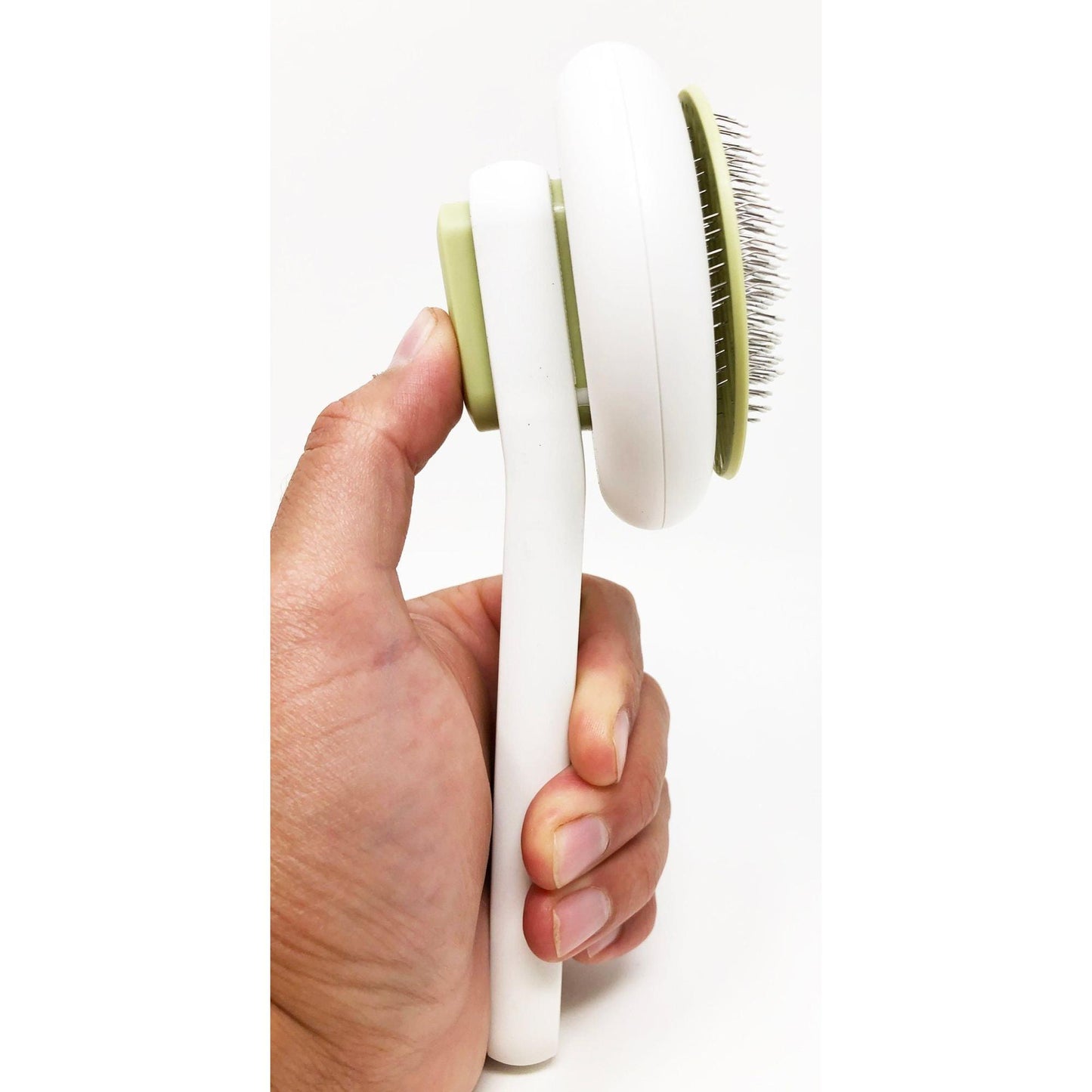 The Pet Life 'Concepto' comb is a modern, sleek, and gentle tool for removing pet hair. - Wolldi