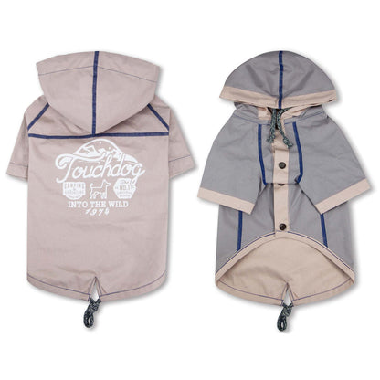 The Touchdog 'Cloudburst' Waterproof Reversible Dog Raincoat is adjustable, waterproof, and stylish. - Wolldi