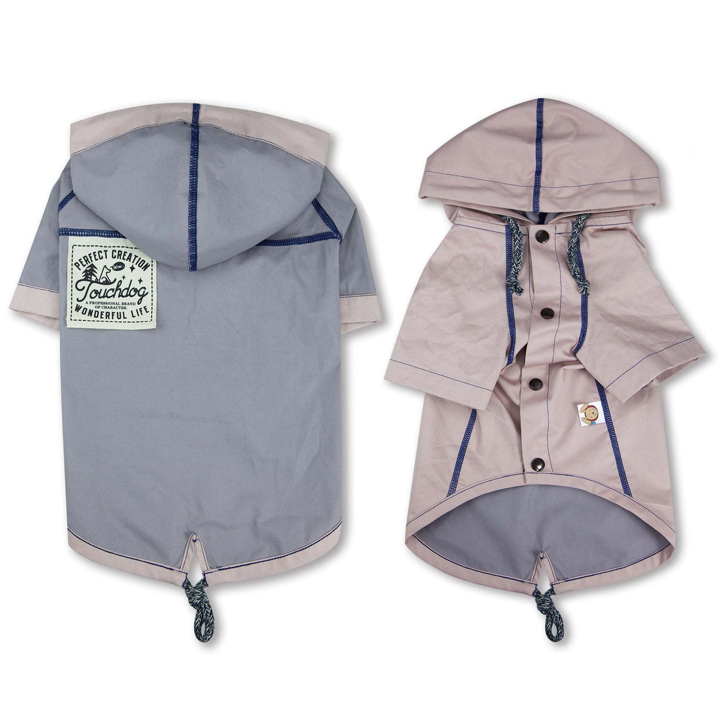 The Touchdog 'Cloudburst' Waterproof Reversible Dog Raincoat is adjustable, waterproof, and stylish. - Wolldi