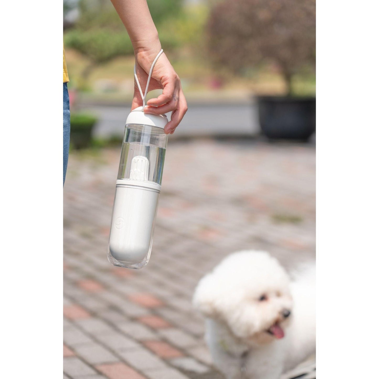 The PYURE handheld water feeder removes harmful chemicals, holds 12.2 oz, and is perfect for travel. - Wolldi