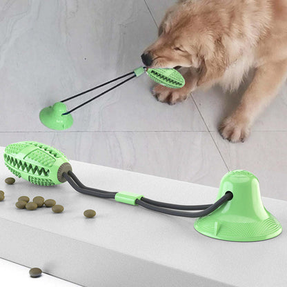 The Pet Life 'Grip N' Play' Dog Toy suctions to surfaces, dispenses treats, and cleans teeth. - Wolldi