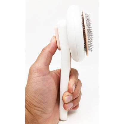 The Pet Life 'Concepto' comb is a modern, sleek, and gentle tool for removing pet hair. - Wolldi