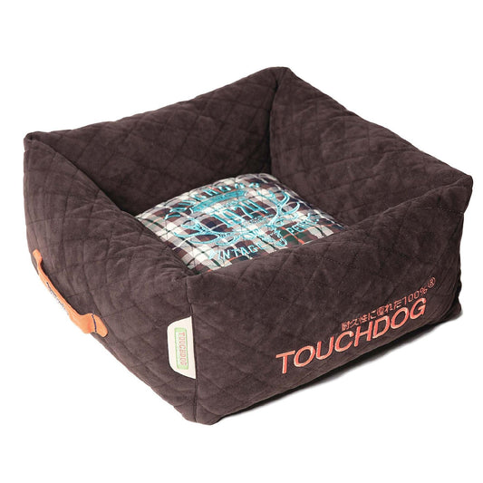 Luxury rectangular dog bed with diamond-stitched fleece and removable plaid pillow.