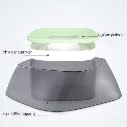 Spill-proof pet water bowl with floating splash guard. Dishes