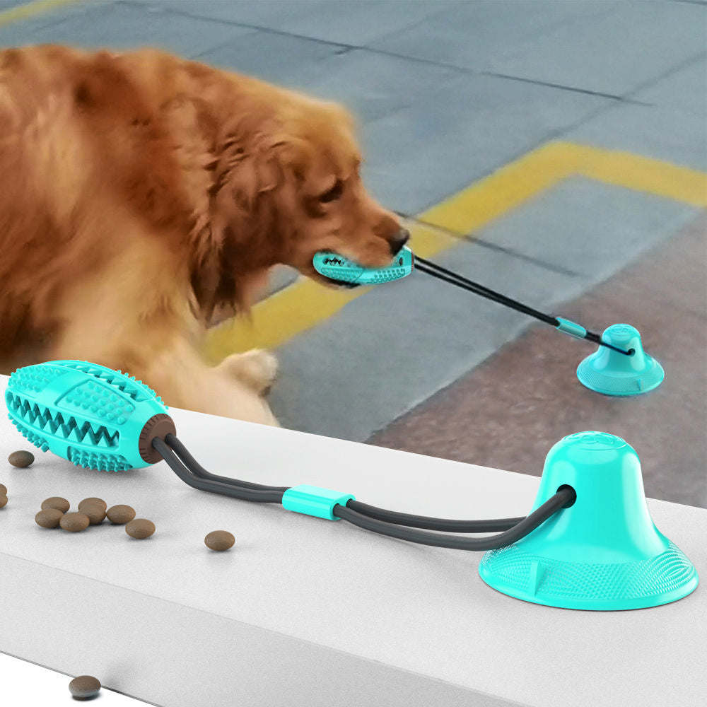 The Pet Life 'Grip N' Play' Dog Toy suctions to surfaces, dispenses treats, and cleans teeth. - Wolldi