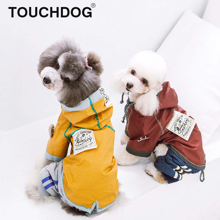 The Touchdog 'Cloudburst' Waterproof Reversible Dog Raincoat is adjustable, waterproof, and stylish. - Wolldi