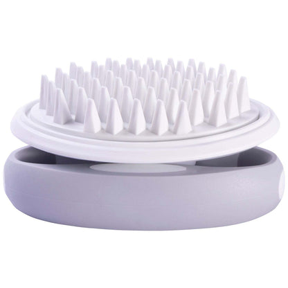 The Pet Life 'Gyrater' Swivel Travel Silicone Massage Brush is compact and perfect for travel, with customizable grip settings and soft silicone bristles for massaging and bathing. Suitable for all hair lengths. - Wolldi