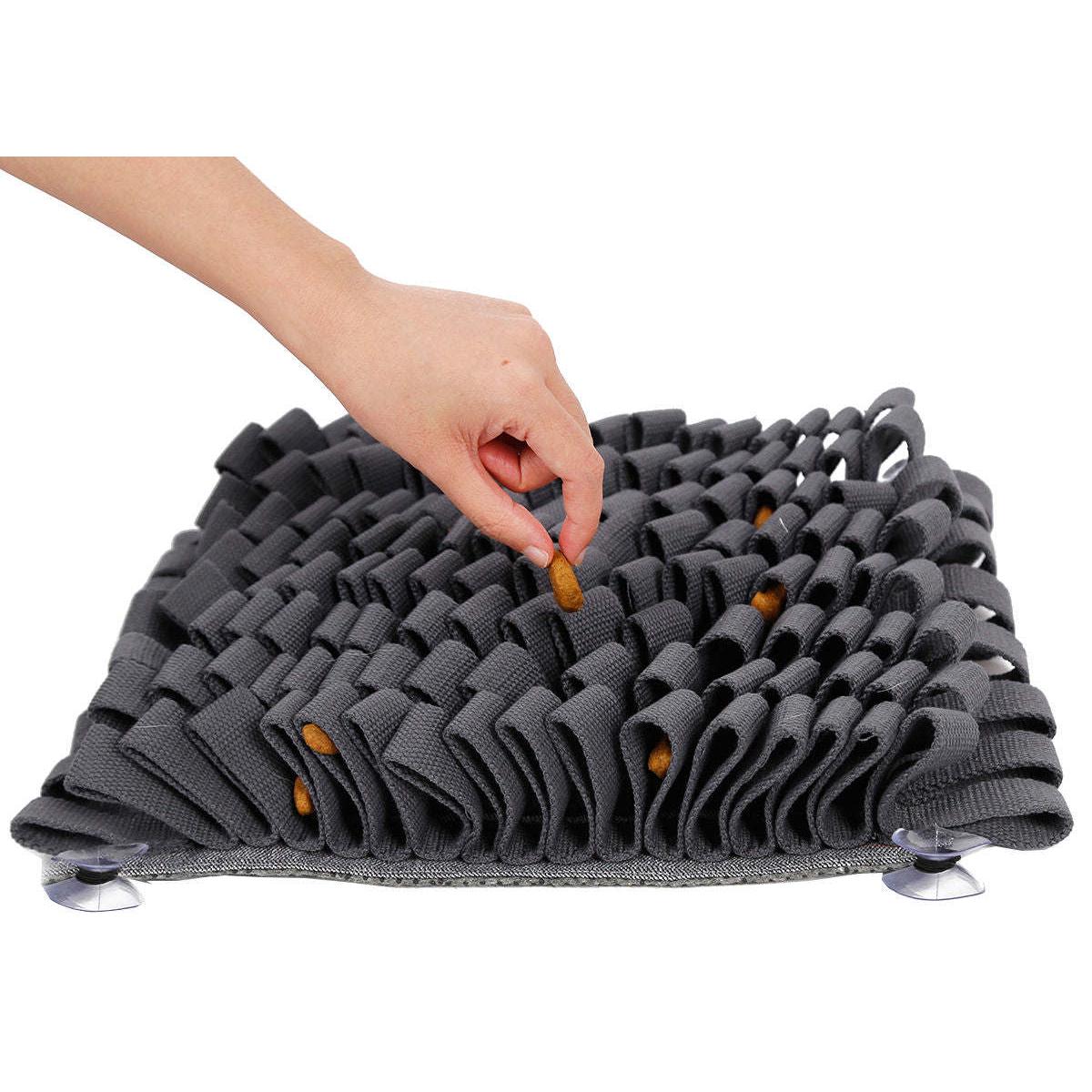 The Pet Life 'Sniffer Grip' is a suction-based snuffle mat for pets, perfect for cognitive development and digestive aid. - Wolldi