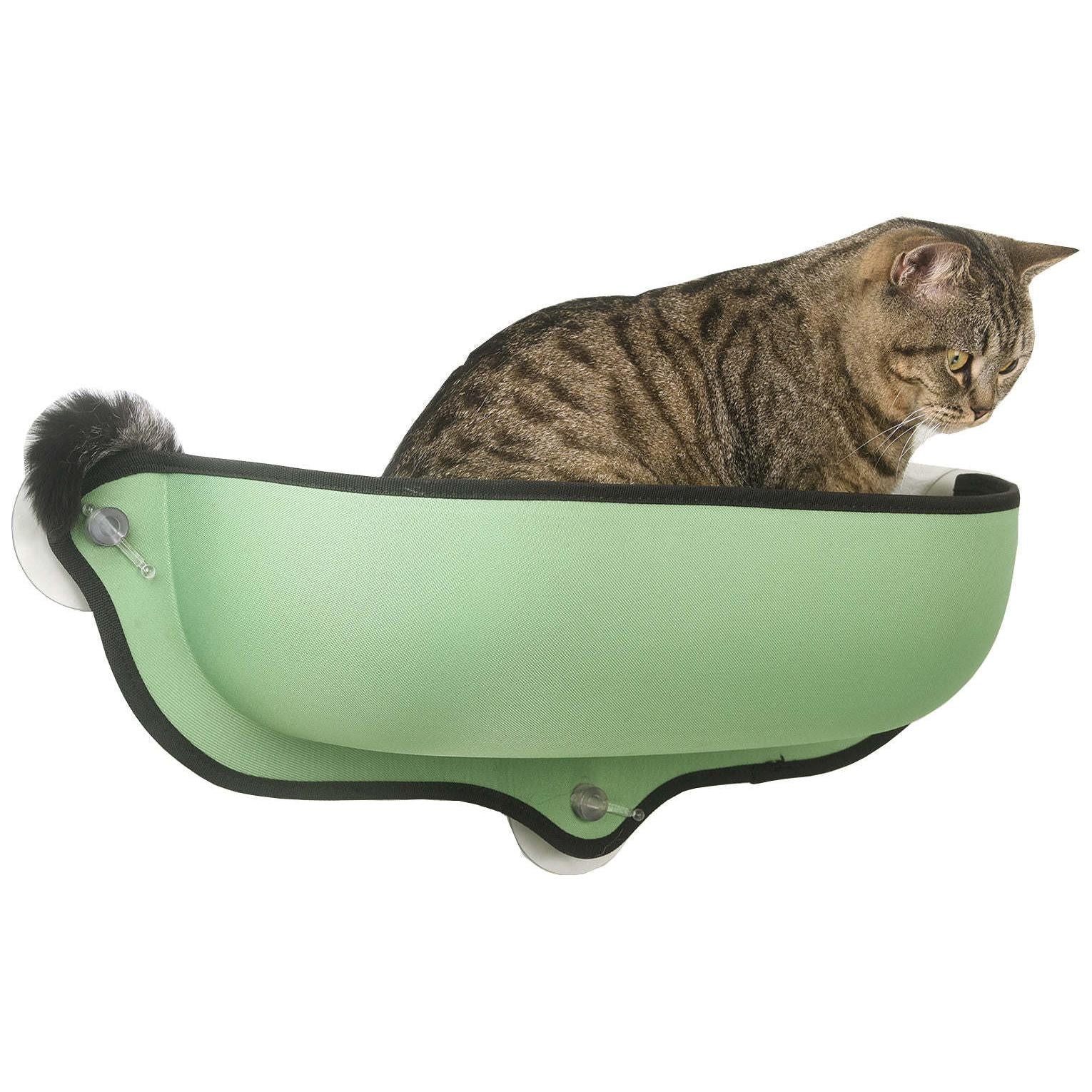 'Suction cup cat lounger attaches to glass and hard surfaces.' - Wolldi