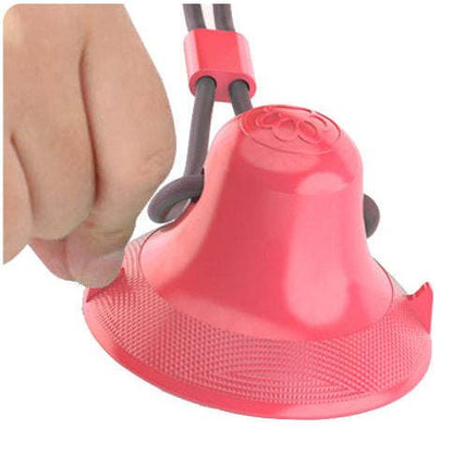 The Pet Life 'Grip N' Play' is a suction cup dog toy with treat dispensing pockets. - Wolldi