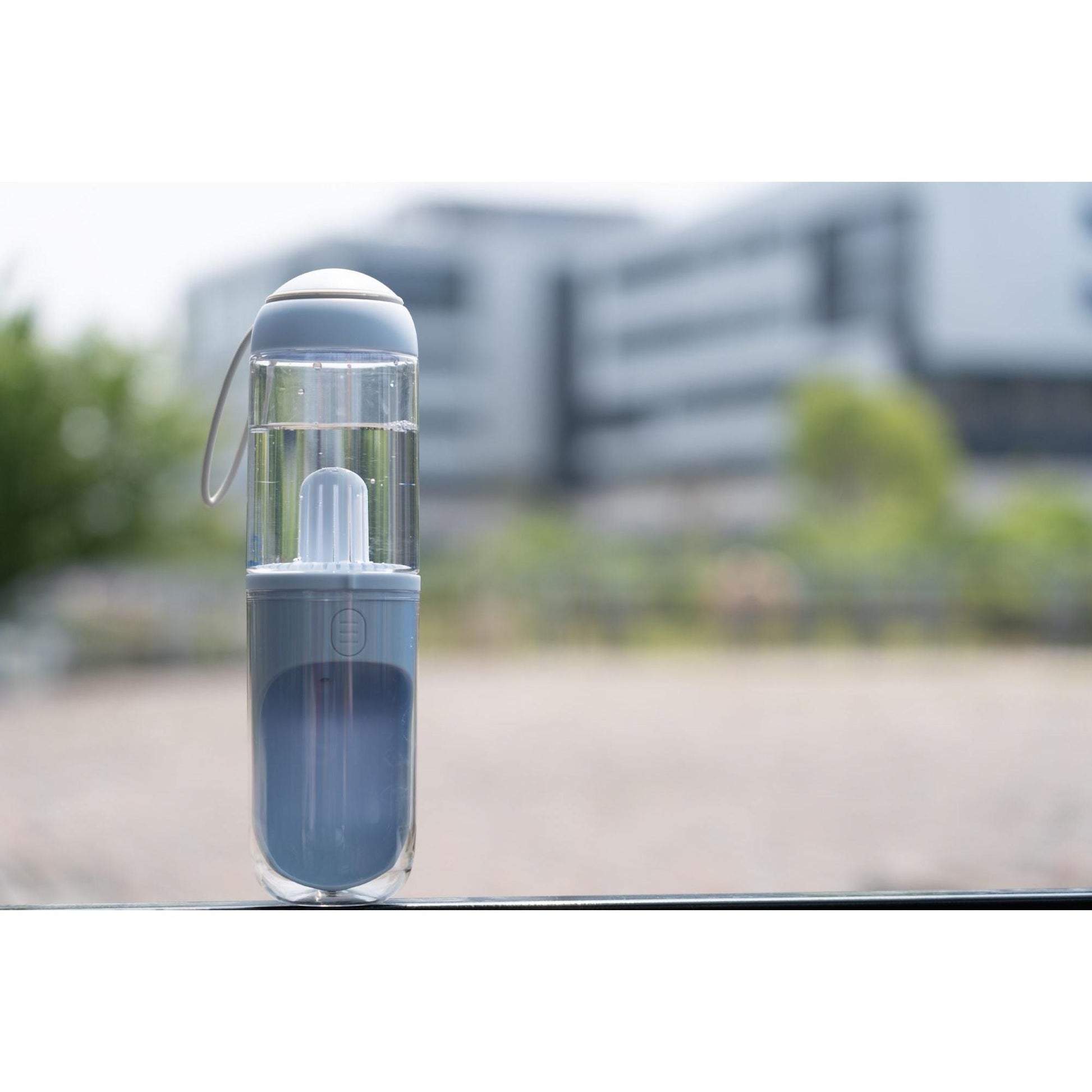 The PYURE handheld water feeder removes harmful chemicals, holds 12.2 oz, and is perfect for travel. - Wolldi