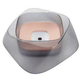 Spill-proof pet water bowl with floating splash guard. Dishes