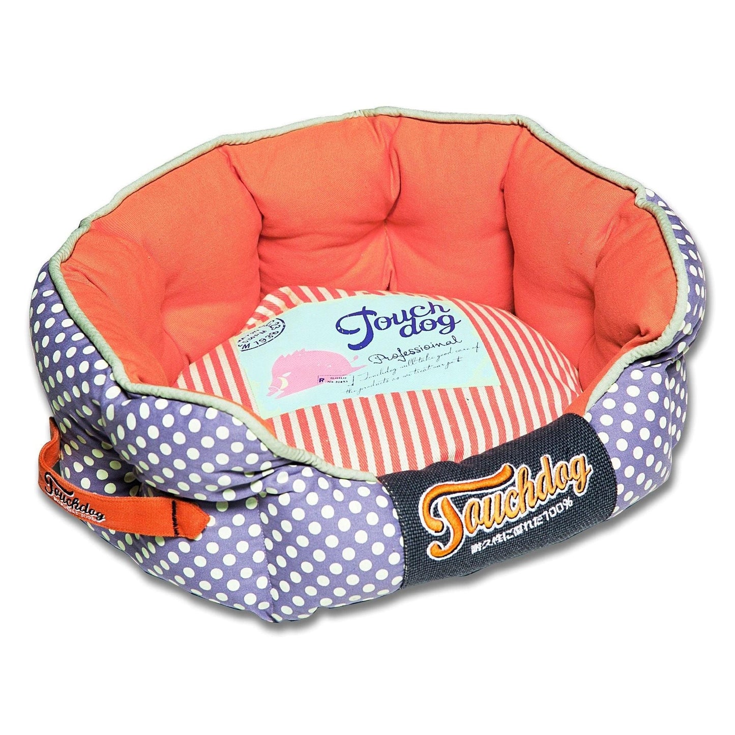 Polka-striped reversible dog bed with carrying handle.