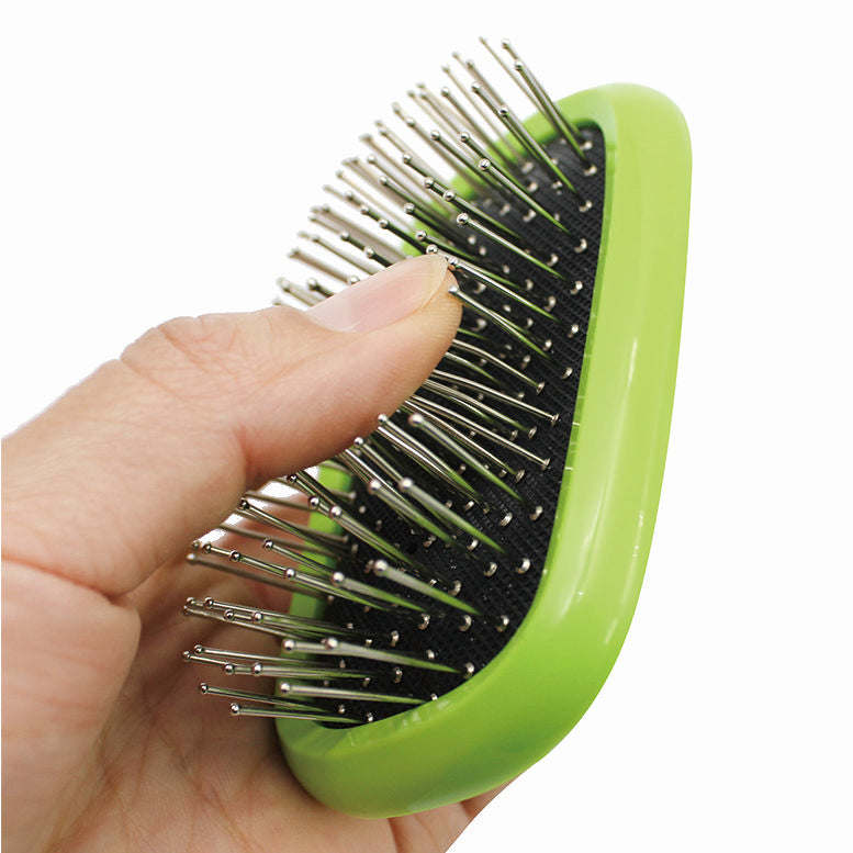 The Pet Life 'Conversion' 5-in-1 Grooming Tool is a versatile, easy-to-use pet comb with interchangeable brushes for all breeds and hair types. - Wolldi