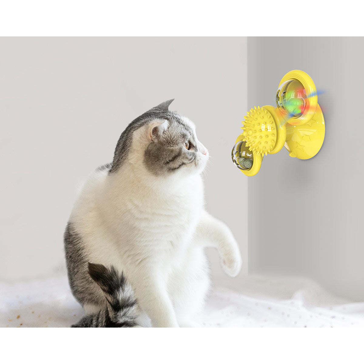 The Pet Life 'Windmill' Cat Toy suctions and spins on hard surfaces. - Wolldi